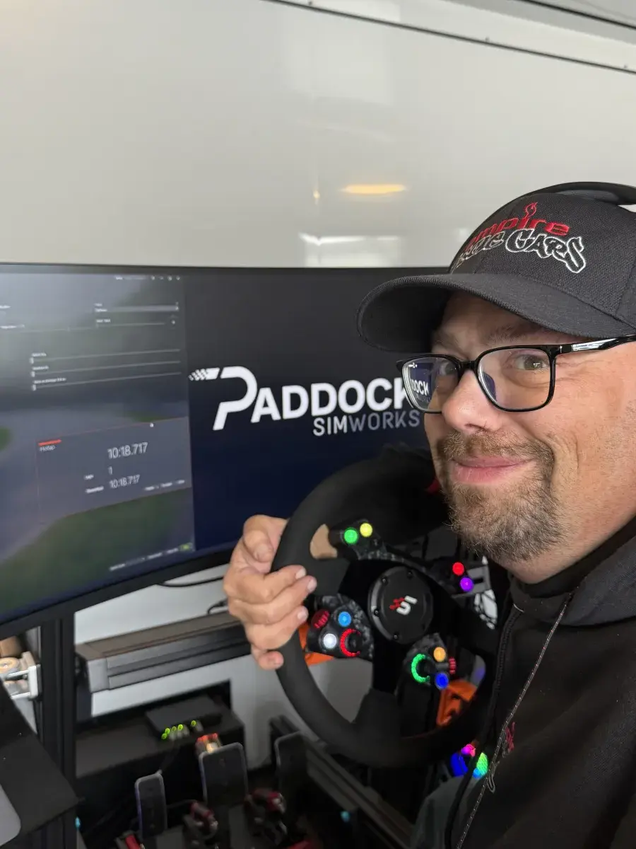 Driver selfie with Paddock branding on screen