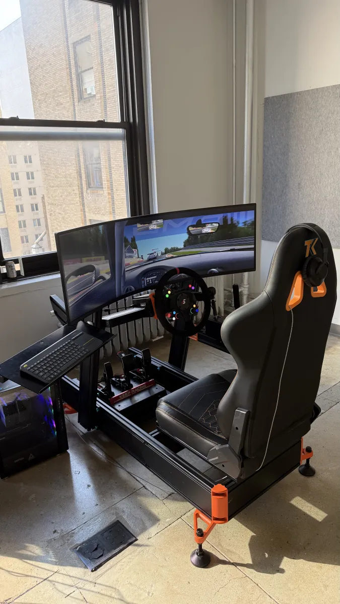Side angle of sim rig in office space