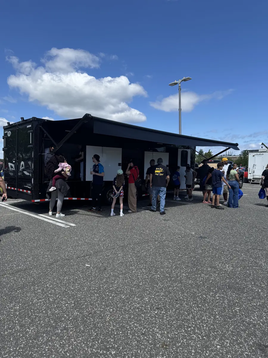 Large crowd at race trailer event