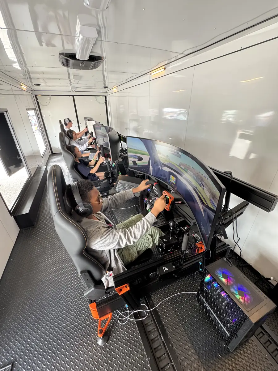 Two drivers racing side by side