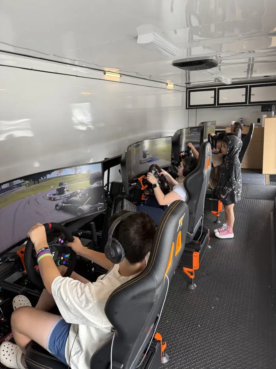 Group of kids racing inside trailer